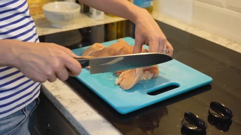 Close up slicing chicken Stock Footage 93619097
