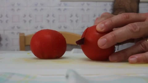 Close Up of Slicing Fresh Red Tomatoes with Knife on Cutting Board Stock Footage 340240272