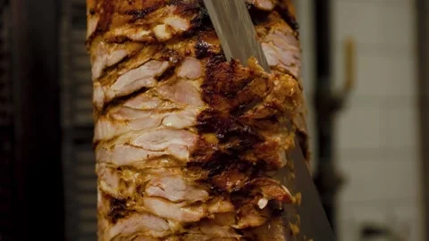 Close-Up Slicing Meat Off Doner Kebab Stock Footage 317839620