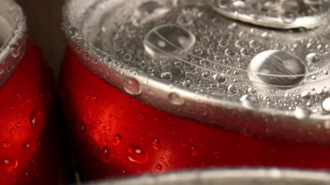 Close-up slide along several cans of cola. Stock-Footage 147846975