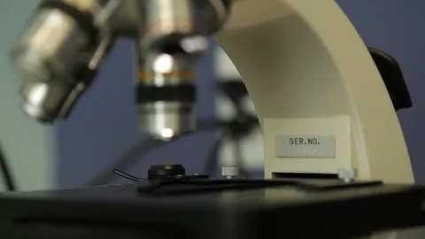 Close up on slide and lenses of a microscope Stock Footage 91058022