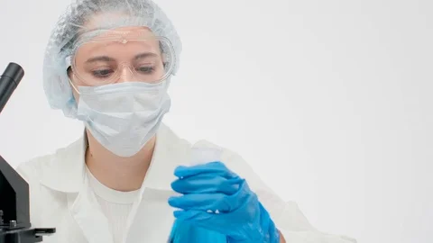 Close-up slider frame of a beautiful young woman assistant holdi Stock Footage 128233583