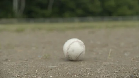 Close up slider shot of baseball coming into focus in slow motion, 4k Video stock 112274011