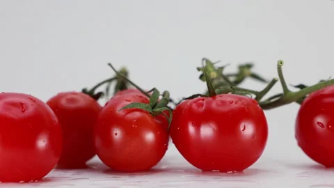 A Close-Up Slider Shot Moves From Left To Right Across A Bunch Of Fresh Red Cher 스톡 동영상 328098350