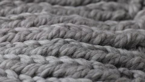 Close slider view of thick wool knitted fabric with soft craft texture Stock Footage 322709338