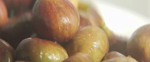 Close-up sliding on common figs 5.7K anamorphic video Stock Footage 316113250