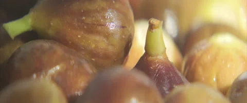 Close-up sliding on common figs anamorphic 4K video Stock Footage 315550862