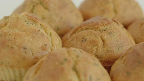 Close-up sliding by cornbread muffins 4K footage Stock Footage 180913899