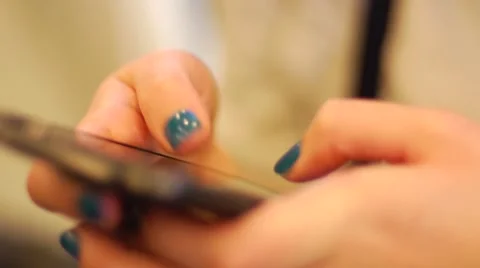 Close-up of sliding fingers social network via smart phone Stock Footage 44726052