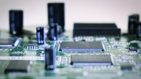 Close-up sliding shallow depth focus video of pcb, electronic parts, IC. 4k Stock Footage 123540091