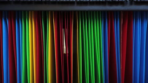 Close-up sliding shot of colored tabs Stock Footage 170949849