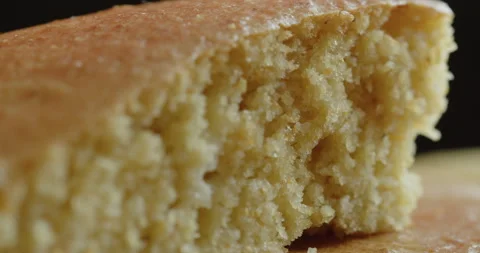 Close-up sliding on tasty cornbread meal 4K footage Stock Footage 251236784
