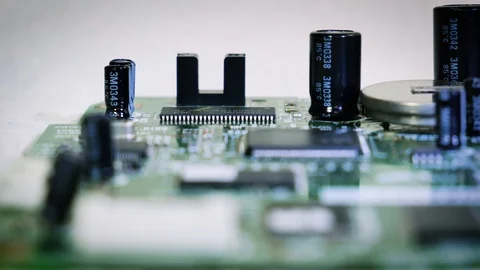 Close-up sliding video of printed circuit board - cap[acitors, resistors. 4k Stock Footage 123540550