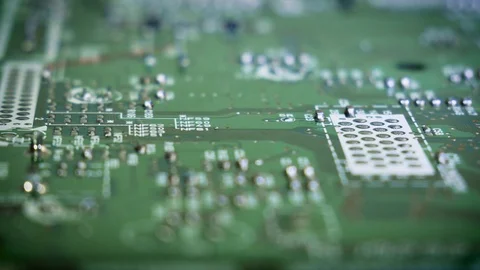 Close-up sliding video of printed circuit board - soldered side. 4k 動画素材 123540832