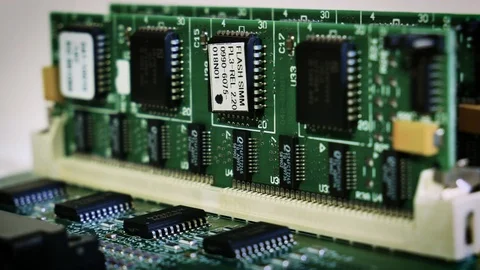 Close-up sliding video of printed circuit board - pcb, electronic parts, RAM. 4k Stock Footage 123570385