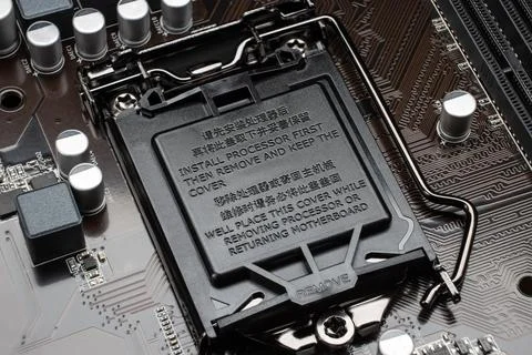 Close-up of the slot for installing the processor closed with a plastic prote Stock Photos