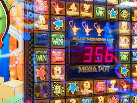 Close-up of a slot machine in an arcade Stock Photos