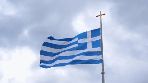 Close Up Slow Greek Flag Blowing in Wind Slow Motion on Pole with Dramatic .. Stock Footage 336515694