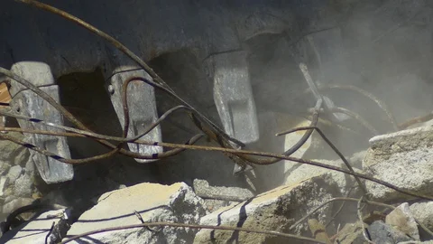 Close up, Slow Mo. Excavator scraping the ground of demolition site. Breaking up Video stock 88476348
