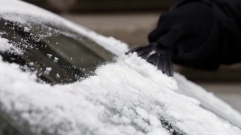 Close Up Slow Mo Of Scraping Snow From Automobile Glass Stock Footage 124651037