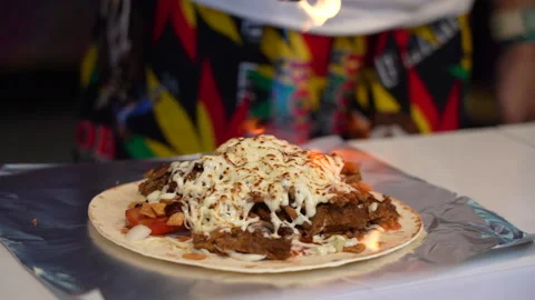 Close up slow motion 35 Burning cheese by fire on the meat kebab. 库存影片 138072323