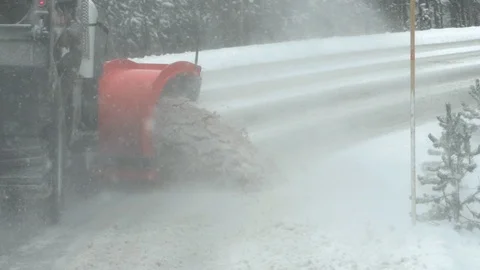 Close up slow motion clip of a snow plow clearing road in yellowstone Stock Footage 122914882