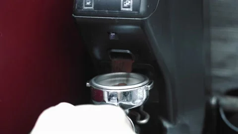 Close-up, slow motion, coffee machine holder fill up flickered coffee  machine Video stock 133185193