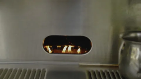 Close-up, Slow Motion, Flame of The Strip Burns Inside Retro Coffee Machines Stock Footage 146911403