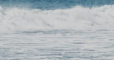 Close up of Slow Motion Footage of Waves Crashing on the Beach - Stock Video Stock Footage 239478845