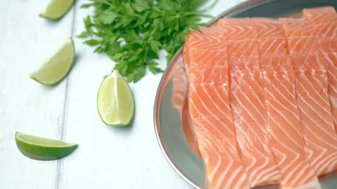 Close-up slow-motion of fresh raw red salmon. Video stock 132786178