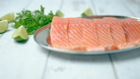 Close-up slow-motion of fresh raw red salmon. Stock Footage 132786690