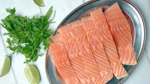 Close-up slow-motion of fresh raw red salmon. Video stock 132787003
