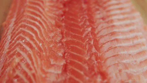 Close up slow motion of fresh raw salmon fillet showing natural patterns an.. Stock Footage 334664363