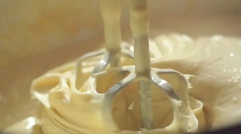 Close-up of slow motion mixing muffin mixture with electric mixer FullHD 1080p Stock-Footage 66567993