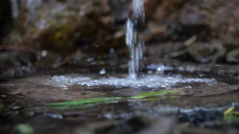 Close up slow motion mountain spring water, Asian style，temple Stock Footage 154581862