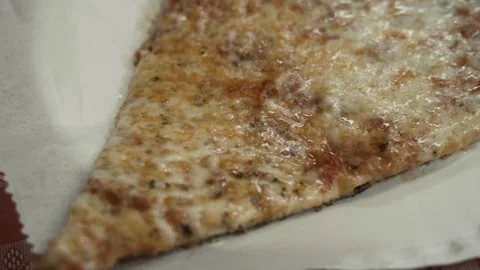 Close up Slow Motion Pan of pizza slice Williamsburg Brooklyn Stock Footage 252330696