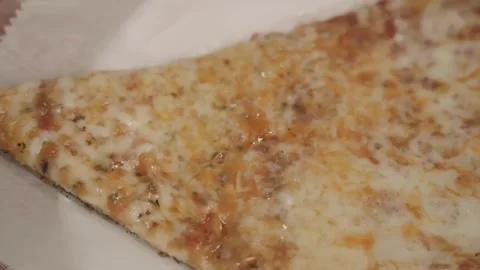 Close up Slow Motion Pan of pizza slice Williamsburg Brooklyn Stock Footage 252330744