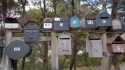 Close-Up slow motion panning along a row of mailboxes Stock Footage 108653555