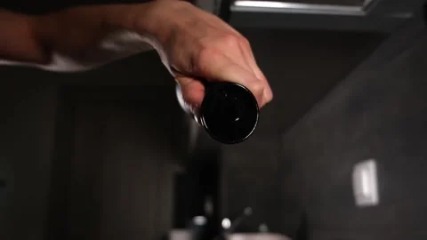 Close up slow motion of pouring olive oil on frying pan. Video stock 154712930