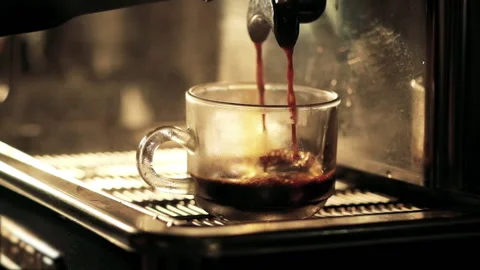 Close-up Slow motion of prepares espresso pouring from coffee machine Stock-Footage 138850731