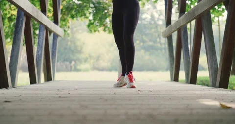 Close up slow motion shot, beautiful young woman in sportswear doing pirouette. Stock Footage 120239302