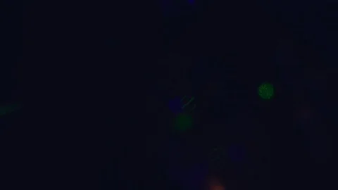 Close up slow motion shot, Blurred color party lights on a dark background. Stock Footage 120839756