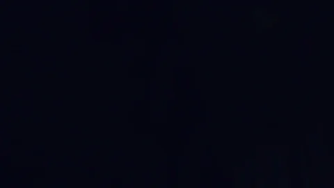 Close up slow motion shot, Blurred color party lights on a dark background. Stock Footage 120841535