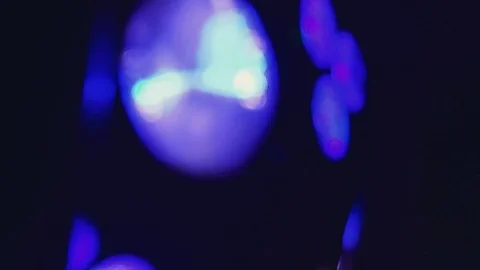 Close up slow motion shot, Blurred color party lights on a dark background. Stock Footage 120842753