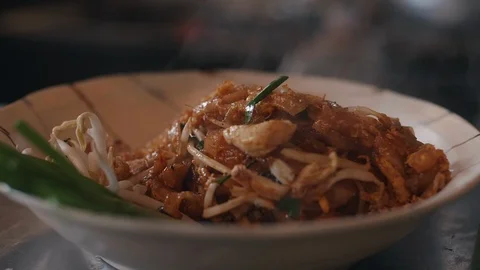 Close up slow motion shot of Chef decorating thai food Stock Footage 91085812