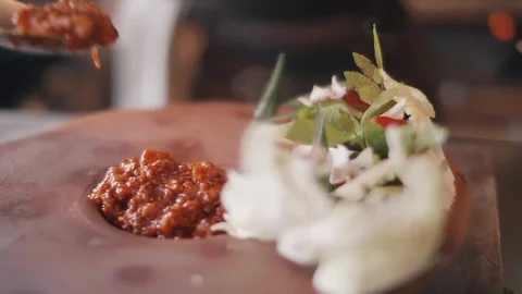 Close up slow motion shot of Chef decorating thai food Stock Footage 91087094