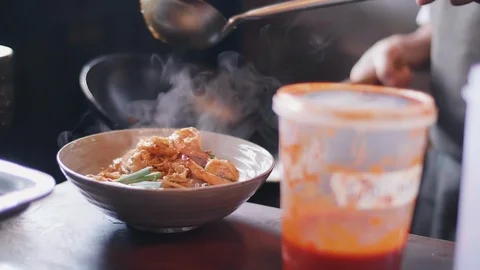 Close up slow motion shot of Chef decorating thai food Stock Footage 91087336