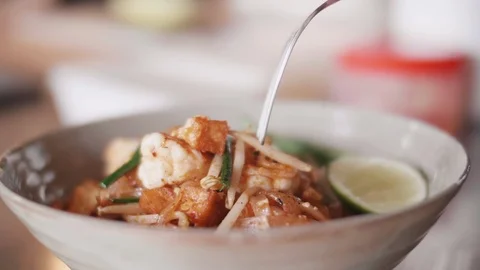 Close up slow motion shot of Chef decorating thai food Stock Footage 91087501