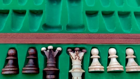 Close up slow motion shot of handmade / handcrafted wooden Chess pieces Stock Footage 130976016