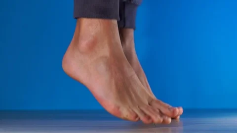 Close up slow motion shot of legs sports bare feet jump Video stock 101822132